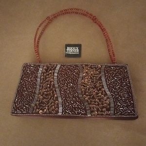Brown satin, beaded, 9.5 x 4.5, with beaded handles & corded shoulder strap.
